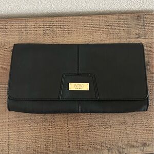 BCBG Paris Sleek Black Vegan Leather Magnet Closure Clutch Handbag Gold Logo